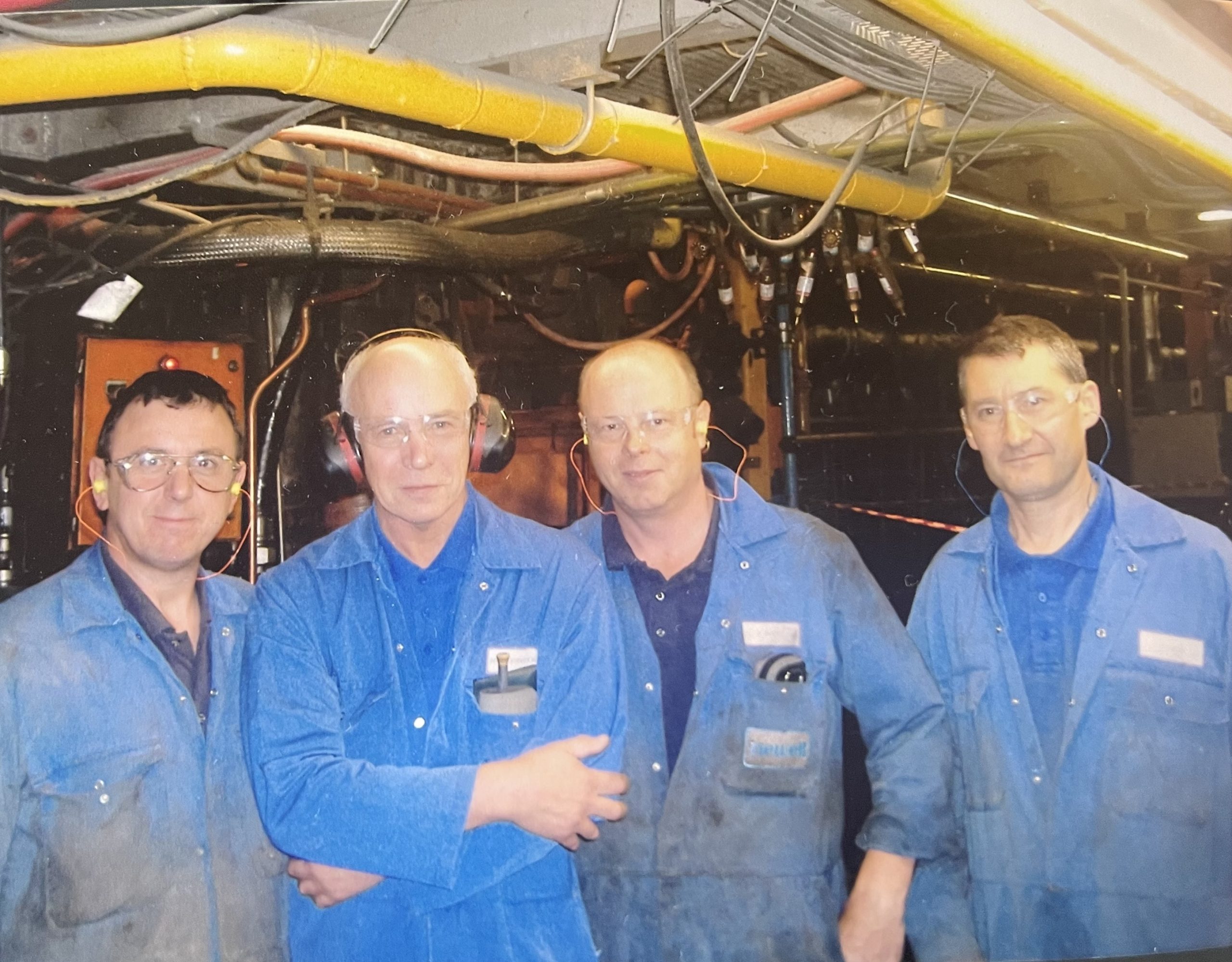 The last day of production at the Pyrex factory. Brian Gilham, Brian Stephenson, Phil Short, Dave Dixon (left-right) Logo